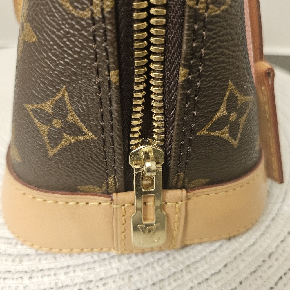 Louis Vuitton Alma BB World Tour Monogram Crossbody Bag - Picture 4 of 14